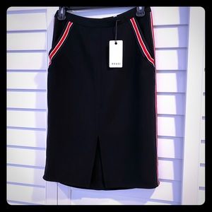 Black skirt with red and white detail